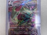 a close up of a pokemon card in a plastic case