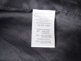the label of a black jacket with a white label on it