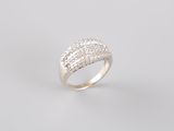 a white gold and diamond ring on a grey background