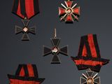 an image of a group of medals and ribbons on a black background