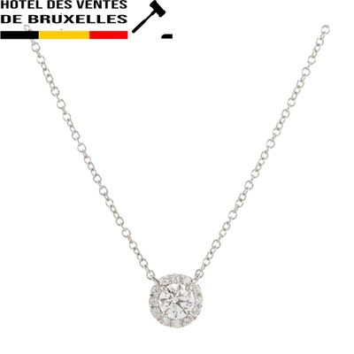 a white gold necklace with a diamond pendant on a chain