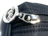 a close up of a zipper that has a metal clasp on it