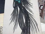 a drawing of a bird on a piece of paper