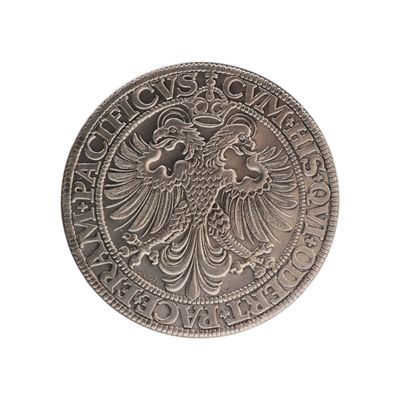 une image représentant une pièce d'argent sur laquelle figure un aigle