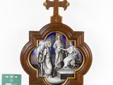 a wooden cross with a picture of jesus and other religious figures