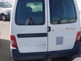 a white van that is parked in a parking lot