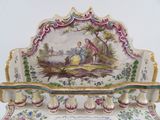 a picture of a decorative bench with a painting on it