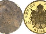 Quatre types différents de pièces d'or sont représentés sur un fond blanc.