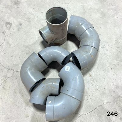 a couple of pipes laying on the floor next to each other