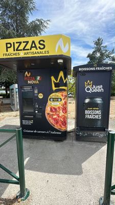 two vending machines that are on the side of the road