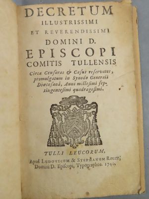 an old book with a black and white image of a lion on it