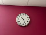 a clock that is on the wall in the room