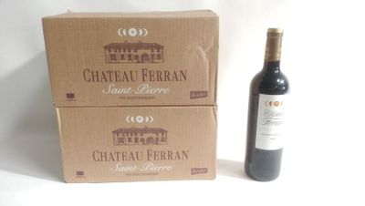 two boxes of wine sitting next to a bottle of wine