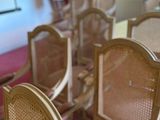 many chairs that are lined up in a room