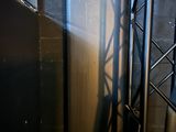 a refrigerator that is sitting in the corner of a room