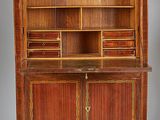 an old wooden cabinet with drawers and drawers on top of it