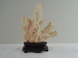 a sculpture of a plant that is on a table