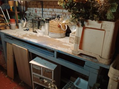 a blue table with a cake on top of it