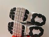 a close up of a pair of shoes on top of a box