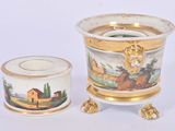 two vases that have been painted with a landscape on them