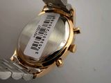 an image of a close up of a wrist watch with a bar code on it