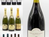 de nombreuses bouteilles de vin et des bouteilles de vin sur la table