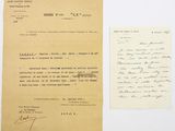 an old letter and a piece of paper on a white surface