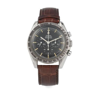 a close up of a watch on a white background with a brown strap