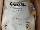 un sac de litière pour chat dans une boîte en carton