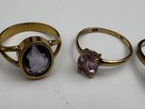 three rings with amethorate, amethorate, and amethorate on them