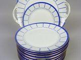 six blue and white plates stacked on top of each other