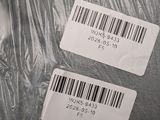 two labels on the back of a plastic bag