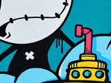 graffiti painting of a panda bear with a boat in the ocean