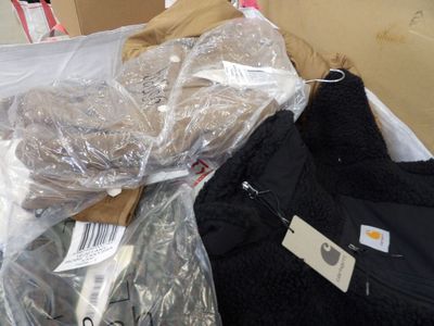 a pile of clothing sitting on top of a table