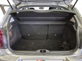 a trunk of a car with the back door open
