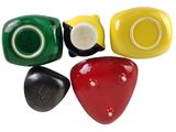 four different colored buttons on a white background