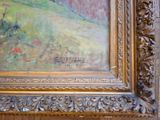 a picture of a painting on the wall of a room