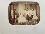 an old photo of a group of people posing for a picture