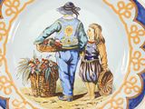a plate with a picture of a man and a child on it