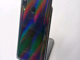 an image of a close up of a cell phone on a stand