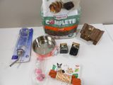 a bag of cat food, a bowl of catnip, a bowl of catnip, a bowl of catnip, and other items