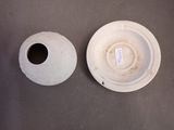 a white plate and a white bowl on a table