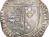 a close up of a coin with a coat of arms on it