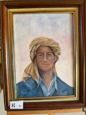 tableau représentant un homme portant un turban, dans un cadre en bois