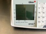 a close up of a digital scale on a table