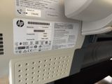 a close up of a printer on the back of a plane