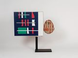 an image of a sculpture of a football field with a ball on it