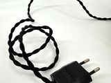a black cord that is connected to a black plug