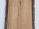 a picture of a piece of wood that has been torn off