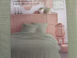the bedding is in the box for sale on the table